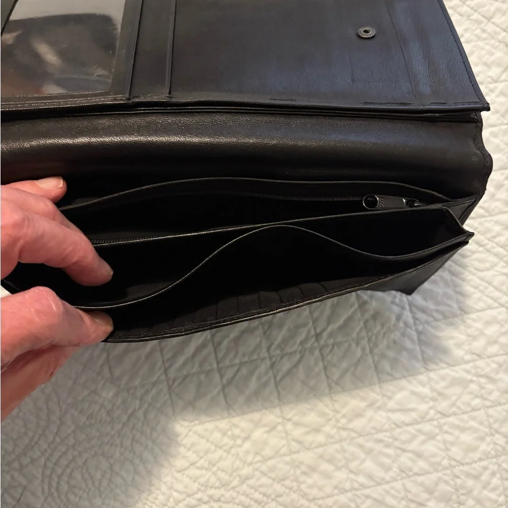 Tumi travel wallet passport card organizer.